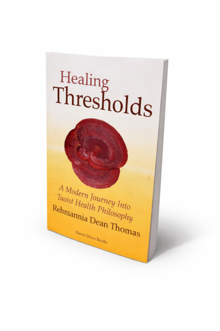 Healing Thresholds book with reishi mushroom